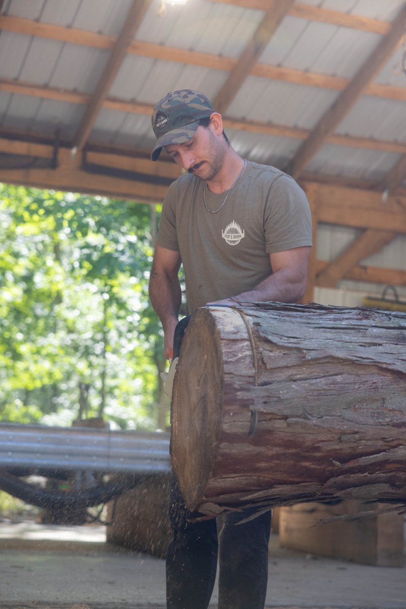 Will (WillBill) handling a log at the mill